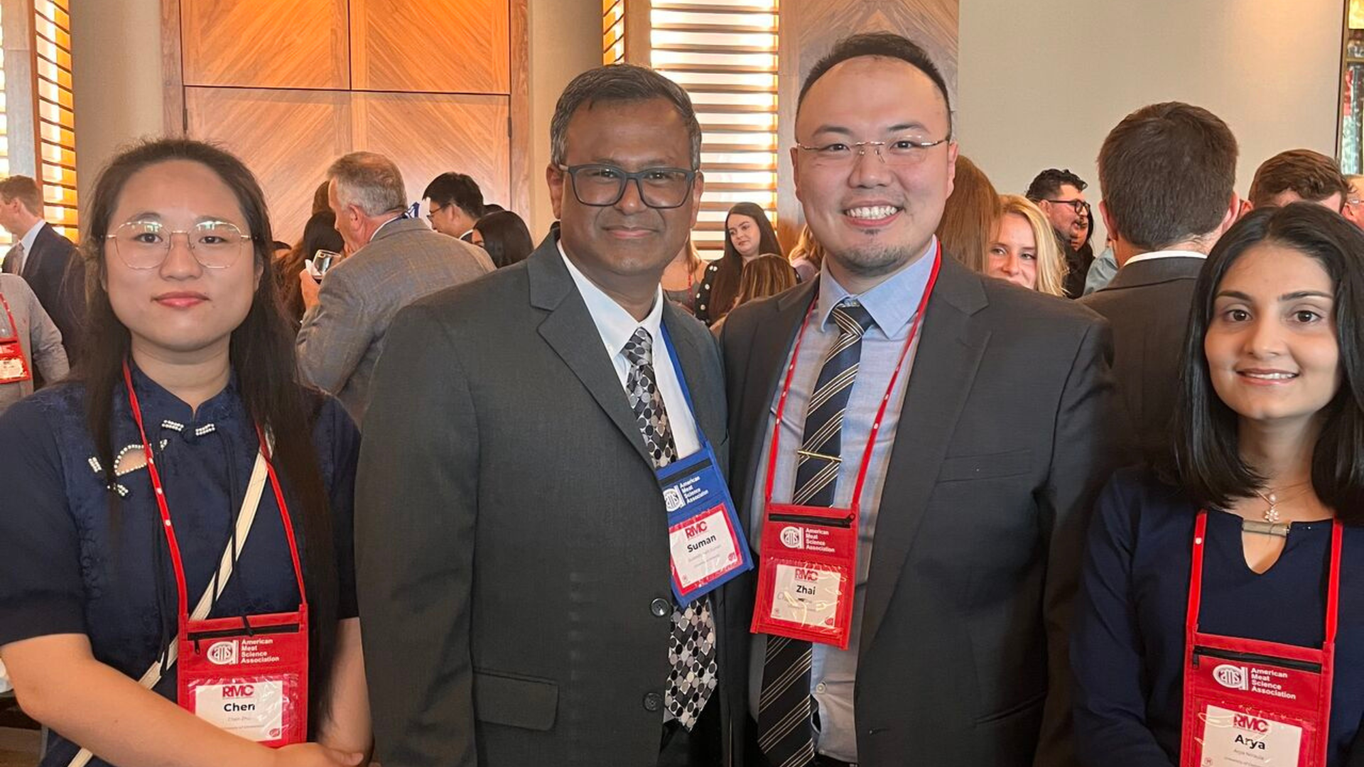 Dr. Chaoyu Zhai posing for a photo alongside his graduate students and Dr. Suman Surandranath.