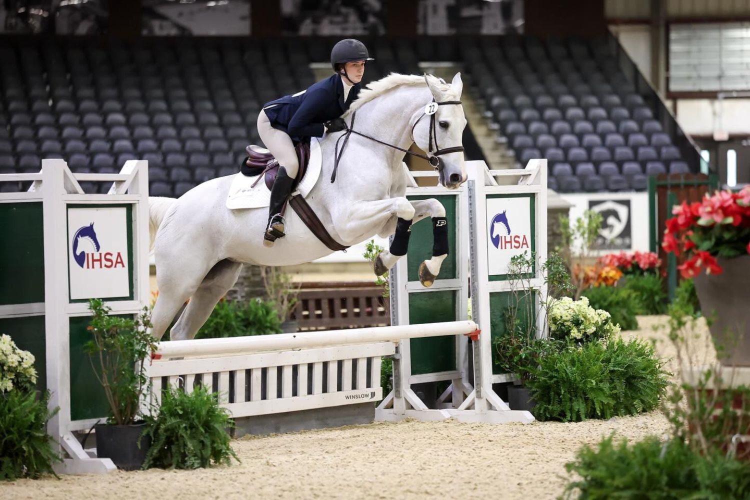Student Jumping with Horse