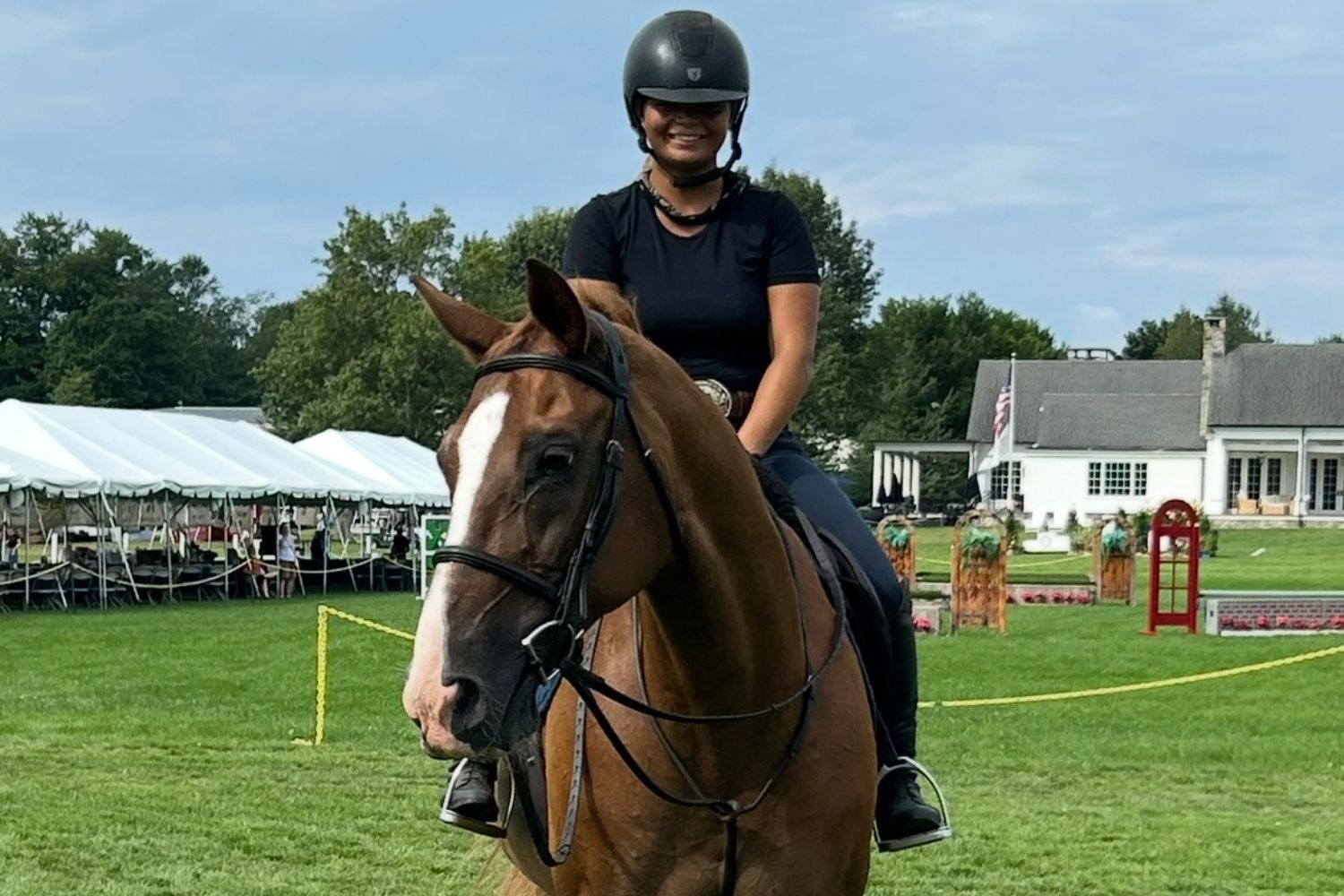 a woman riding a horse